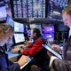 Stock traders working at New York Stock Exchange