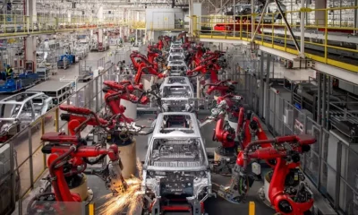 Robotic assembly line in car manufacturing factory