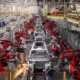 Robotic assembly line in car manufacturing factory