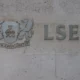 London Stock Exchange Group logo on building wall.