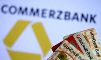 Credit cards in front of Commerzbank logo.