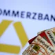 Credit cards in front of Commerzbank logo.