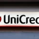 UniCredit logo on a sign.