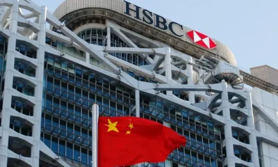 HSBC headquarters with Chinese flag in foreground.