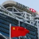 HSBC headquarters with Chinese flag in foreground.