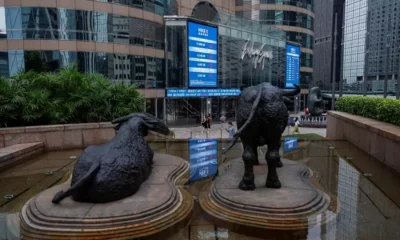 Sculptures of bull and bear outside Hong Kong Stock Exchange.