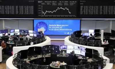 Traders working in Frankfurt stock exchange.