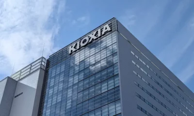 Kioxia headquarters building under blue sky.