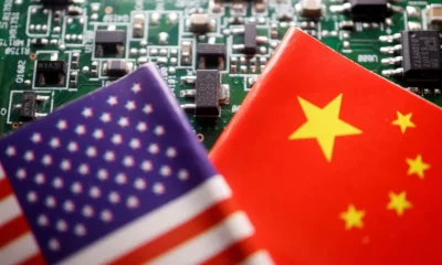 US and China flags on circuit board