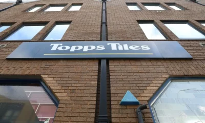 Topps Tiles storefront sign on brick building