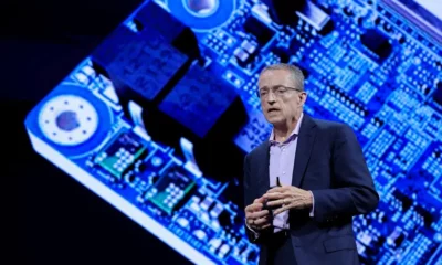 Speaker presents technology, circuit board backdrop