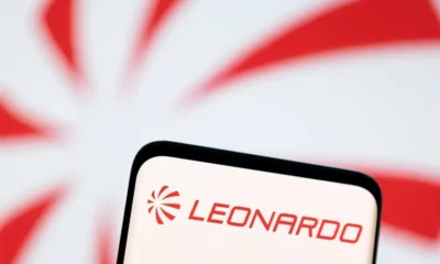 Leonardo logo on smartphone screen, blurred background.