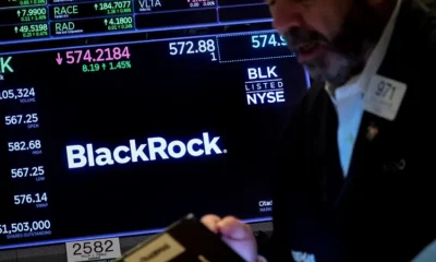 BlackRock stock trading on NYSE display board.