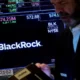 BlackRock stock trading on NYSE display board.