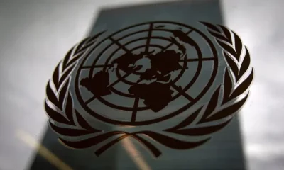 United Nations logo on glass window