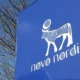 Novo Nordisk logo on blue sign.