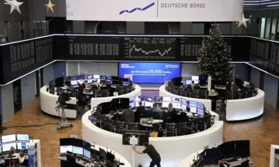 Traders work at Deutsche Börse during Christmas season.