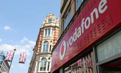 Vodafone store with Union Jack flags in London