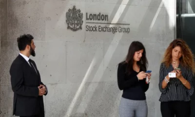 People outside London Stock Exchange Group building.