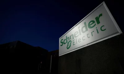 Schneider Electric logo on outdoor sign.