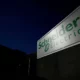 Schneider Electric logo on outdoor sign.