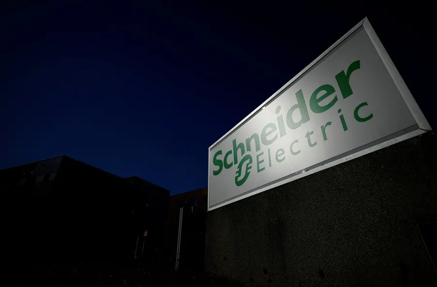 Schneider Electric logo on outdoor sign.