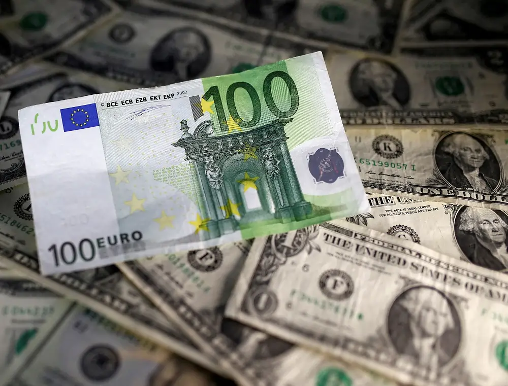 Euro and dollar banknotes mixed together