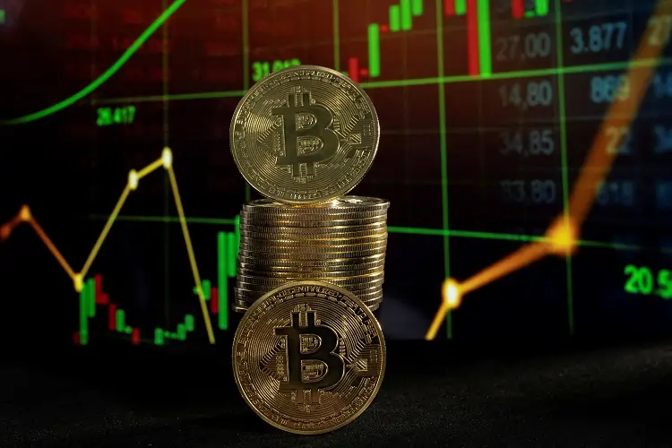 Bitcoin coins with stock market graph background