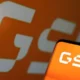 GSK logo displayed on screen and background.