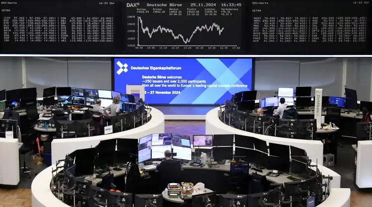 Stock exchange traders at Frankfurt's trading floor.