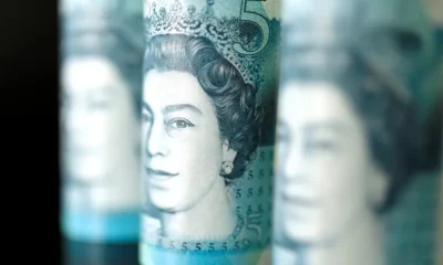 Close-up of UK five-pound banknotes.