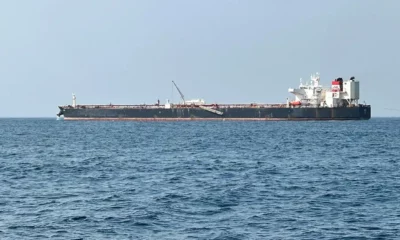 Large oil tanker sailing on open sea.