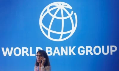 World Bank Group logo with person on phone