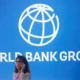 World Bank Group logo with person on phone