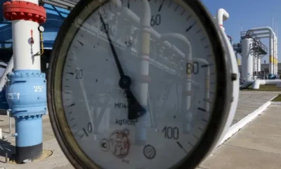 Pressure gauge at industrial gas pipeline facility.