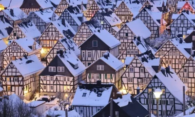 Snow-covered German village with half-timbered houses