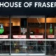 House of Fraser storefront with sale banners displayed.