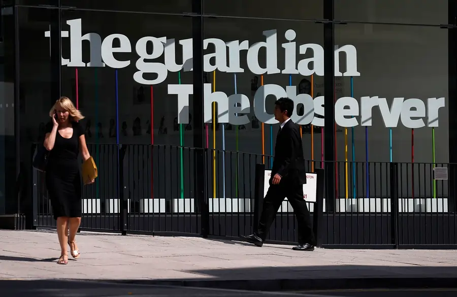 People outside The Guardian office building.