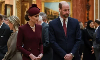 People attending an event in elegant attire.