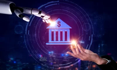 AI hand reaching human hand over digital bank icon