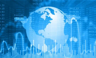 Digital globe with financial data overlay