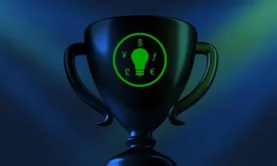 Trophy with currency symbols and lightbulb design